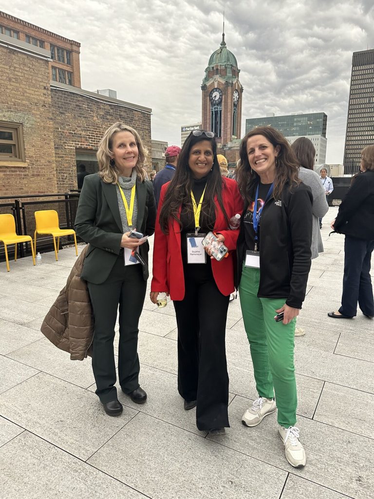 Linda Smith, Dr. Sujatha Ramanujan, and Lisa Belodoff at the eclipse party at NextCorps